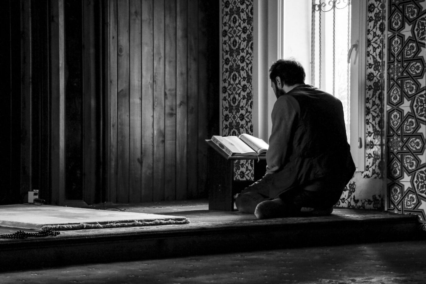 Man Reading Quran